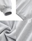 Close-up of gray fabric with texture and stitching details